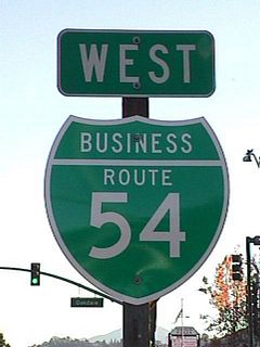 The first shield for SR 54 Business eastbound precedes Oakdale Avenue along 2nd Street south of Interstate 8 in El Cajon. The west banner was removed by 2005.