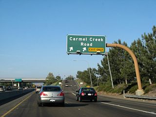 Eastbound California 56 reaches Exit 1, Carmel Creek Road. The next exit along eastbound is Exit 2, Carmel Country Road.