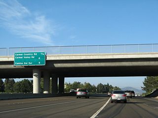 This mileage sign provides the distance to the next three exits along California 56 (Ted Williams Freeway) east: Exit 2, Carmel Country Road; Exit 3, Carmel Valley Road; and Exit 6, Camino del Sur.