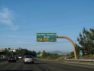 After the on-ramp from Carmel Creek Road, the right lane of eastbound California 56 (Ted Williams Freeway) becomes exit only for Exit 2, Carmel Country Road. Until 2004, the freeway ended after Exit 2 (and all traffic had to use Carmel Valley Road). As of 2004, the gap in the freeway was completed, and today California 56 is a freeway between Interstate 5 and Interstate 15.