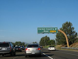 Eastbound California 56 (Ted Williams Freeway) reaches Exit 2, Carmel Country Road. The next exit is Exit 3, Carmel Valley Road.