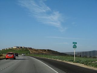 A California 56 east reassurance shield is posted shortly after the on-ramp from Carmel Valley Road.
