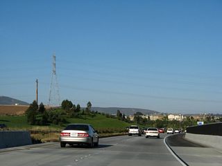 A San Diego Gas and Electric 230kV power line crosses over California 56.