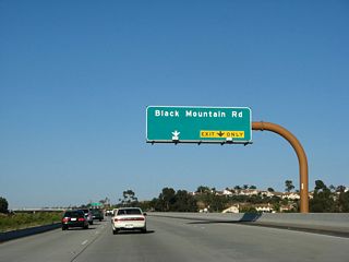 Black Mountain Road travels south to Mira Mesa and north to Rancho Penasquitos, ending at Carmel Valley Road. A back route to 4S Ranch and Rancho Bernardo can be taken via Black Mountain Road north to Carmel Valley Road east. Carmel Valley Road changes into Bernardo Center Drive upon entering 4S Ranch in unincorporated San Diego County, and that name remains upon reentering the city of San Diego at the community of Rancho Bernardo.