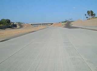This segment of freeway (between Exits 6 and 7) opened on April 11, 2003.
