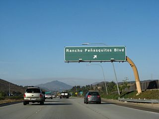 Eastbound California 56 (Ted Williams Freeway) reaches Exit 8, Rancho Penasquitos Boulevard. To the east, Rancho Penasquitos Boulevard connects to Poway Road (San Diego County S-4) en route to the city of Poway.