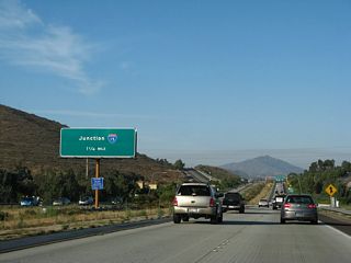 The next exit along California 56 east is Exit 9, Interstate 15. This is the final interchange along California 56 east.