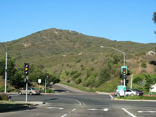 At the end of the off-ramp, turn left to Rancho Carmel Drive north to Carmel Mountain Ranch and turn right to Sabre Springs Parkway south to Sabre Springs.