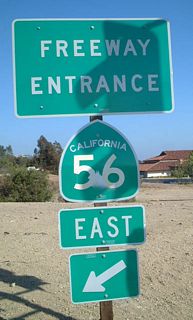 This California 56 freeway entrance shield assembly is located on Black Mountain Road near the overpass.