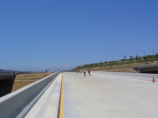 Four bridges carry traffic over Gonzales Canyon, two for each direction of traffic as well as two for each on-ramp/off-ramp from California 56 connecting with Carmel Valley Road (Exit 3).