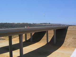 Looking at the westbound bridge for California 56 crosses over Gonzales Canyon.