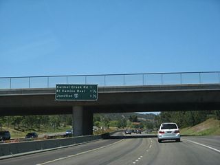 The next three exits along California 56 (Ted Williams Freeway) west are: Exit 1C, Carmel Creek Road; Exit 1B, El Camino Real to Interstate 5 north; and Exit 1A, Interstate 5 south to downtown San Diego and Mexico.