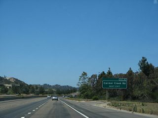 Carmel Creek Road travels north into the community of Carmel Valley.