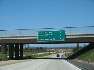 The next three exits along California 56 (Ted Williams Freeway) west are: Exit 6, Camino del Sur; Exit 3, Carmel Valley Road; and Exit 2, Carmel Country Road.