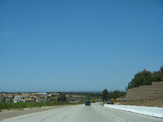 A new soundwall was being installed to limit some freeway noise from impacting neighboring homes.