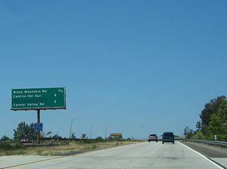 The next three exits along California 56 (Ted Williams Freeway) west are: Exit 7, Black Mountain Road; Exit 6, Camino del Sur; and Exit 3, Carmel Valley Road.