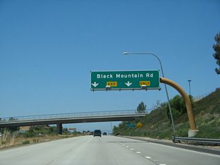 The right two lanes of California 56 (Ted Williams Freeway) west connect to Exit 7, Black Mountain Road.