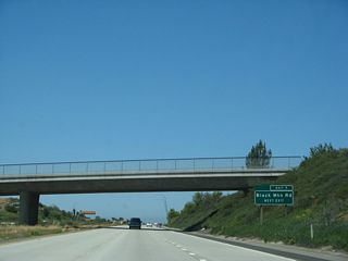 Use Black Mountain Road north to the Black Mountain Ranch community and south to Mira Mesa. Black Mountain Road ultimately ends at Carmel Valley Road several miles north of here; Carmel Valley aims northeast toward 4-S Ranch and Rancho Bernardo and southwest to Pacific Highlands Ranch and Carmel Valley.