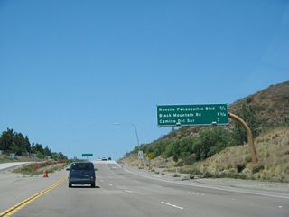 The next three exits along California 56 (Ted Williams Freeway) west are: Exit 8, Rancho Peñasquitos Boulevard; Exit 7, Black Mountain Road; and Exit 6, Camino del Sur.