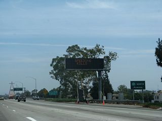 This roadside sign acts as a reassurance marker for California 57 north to Pomona.