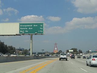 This mileage sign provides the distance to the next three exits on California 57 (Orange Freeway) north: Exit 1B, Orangewood Avenue; Exit 2, Katella Avenue; and Exit 3, Ball Road.