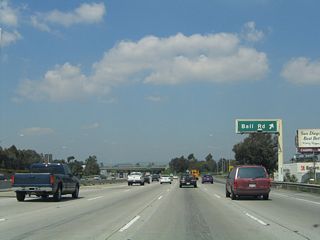Northbound California 57 reaches Exit 3, Ball Road. To the east, Ball Road and Katella Avenue merge together, and they form Orange County S-18 at the California 55 interchange to the east near Villa Park.