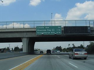 The next three exits along northbound California 57 are Exit 4, Lincoln Avenue; Exit 5, California 91 (Riverside Freeway); and Exit 6, Orangethorpe Avenue. A variable message sign was also installed on this overpass.