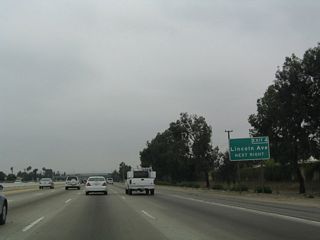 During the spring/summer of 2004, several roadside exit number signs were posted along northbound California 57 within Orange County.