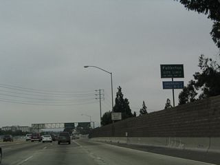 California 57 departs the city of Orange and enters the city of Fullerton, "The Education Community." Fullerton is home to 126,003 people as of the 2000 Census and was incorporated on February 15, 1904.