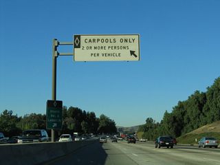 A carpool lane entrance/exit is located prior to the Imperial Highway interchange.