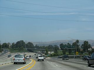 Northbound California 57 (Orange Freeway) reaches Exit 9, California 90 (Imperial Highway).