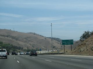 Northbound California 57 approaches Exit 11, Tonner Canyon Road. Note how open this area is compared to the rest of the California 57 freeway south of here.