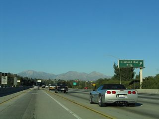 Northbound California 57 reaches Exit 14, Diamond Bar Boulevard. Use Diamond Bar Boulevard northeast into Diamond Bar. Diamond Bar Road reconnects with California 57 and California 60 (at California 60's Exit 25), so this can be an alternate route during times of congestion on the freeways.