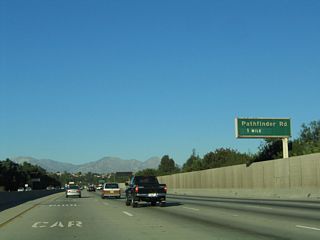 The next exit along northbound California 57 is Exit 15, Pathfinder Road (one mile).