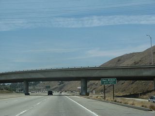 California 57 leaves the city of Pomona and enters the city of San Dimas, its northern terminus. San Dimas had a population of 34,980 as of the 2000 Census and was incorporated on August 4, 1960.