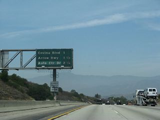 The next three exits along northbound California 57 (former Interstate 210) are Exit 24A, Covina Boulevard; Exit 24B, Arrow Highway; and Exit 25A, Allen Avenue/Auto Centre Drive.