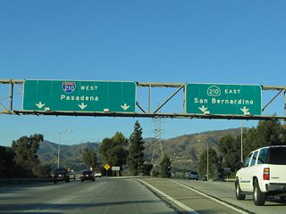 California 57 splits into westbound Interstate 210 and eastbound California 210. California 30 was eliminated here in 2002, the same year Interstate 210 was realigned to end at this interchange. The Glendora Curve Interchange (California 57 and California 210) marks the northern terminus of California 57 (Orange Freeway).