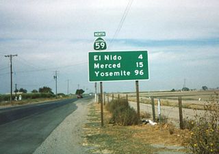 This mileage sign is posted along California 59 north after its junction with California 152 south of Merced.
