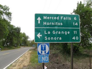 Leaving Snelling, northbound California 59 and eastbound Merced County J-16 (Merced Falls Road) approach their junction with Merced County J-59 (La Grange Road). This intersection marks the northern terminus of California 59. J-16 will continue east toward Lake McSwain and Lake McClure.