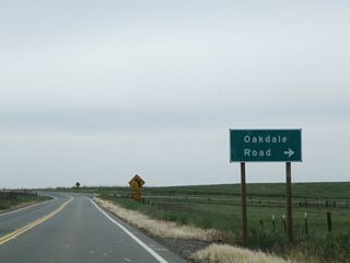 The next major intersection along southbound California 59 is with Oakdale Road, which travels northwest to Waterford.
