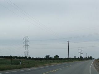 Another Pacific Gas and Electric power line passes over California 59 between Oakdale Road and Bellevue Road near a county disposal site.
