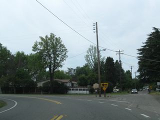 Southbound California 59 and westbound J-16 enters the unincorporated community of Snelling in rural Merced County.