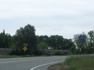 Tuolumne County J-59 originates at the junction of SR 108 and SR 120 west of Jamestown. The two-lane highway proceeds south along La Grange Road toward Snelling and Merced. As is common on Tuolumne County-maintained highways, the J-59 county pentagon route marker is signed in blue and white rather than blue and yellow.