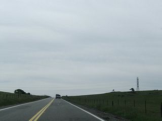 A set of Pacific Gas and Electric power lines crosses over Tuolumne County J-59.