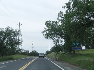 Several miles south, Tuolumne County J-59 (La Grange Road) meets Bonds Flat Road, which travels east to Lake Don Pedro (reservoir) and links with California 132 east en route to Coulterville and California 49.