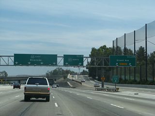 Eastbound California 60 and northbound California 57 meet Exit 24B, Grand Avenue in Diamond Bar. With the addition of a carpool lane and direct HOV connector between California 57 and California 60, this interchange underwent construction between 2002 and 2007. New signs were in place by summer 2007.
