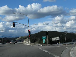 The freeway entrance shield assembly for California 57 north and California 60 east is posted only for California 60 east only.