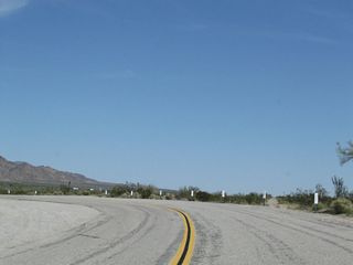 Box Canyon Road (old SR 195) originally converged with Pinto Road (old U.S. 60/70) east from Cottonwood Springs Road directly. This alignment was abandoned when Box Canyon Road realigned northward directly onto Cottonwood Sprigns Road ahead of Interstate 10 at Exit 168.