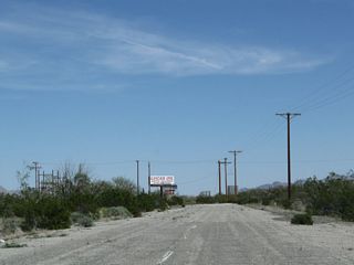 White striping remained visible along Chiriaco Road east of the radio tower. The road dead ends by a small power substation.