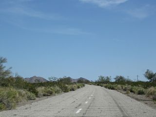 Leaving the 1941 bridge behind, the pavement along Pint Road showed original white lane striping.